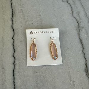 Kendra Scott drop earrings.
